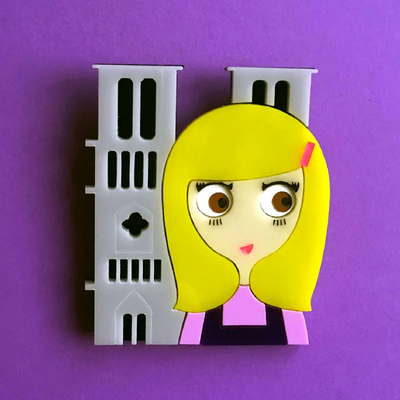 NOTRE-DAME Acrylic Brooch, Brown eyes blonde standing before Notre-Dame de Paris Cathedral